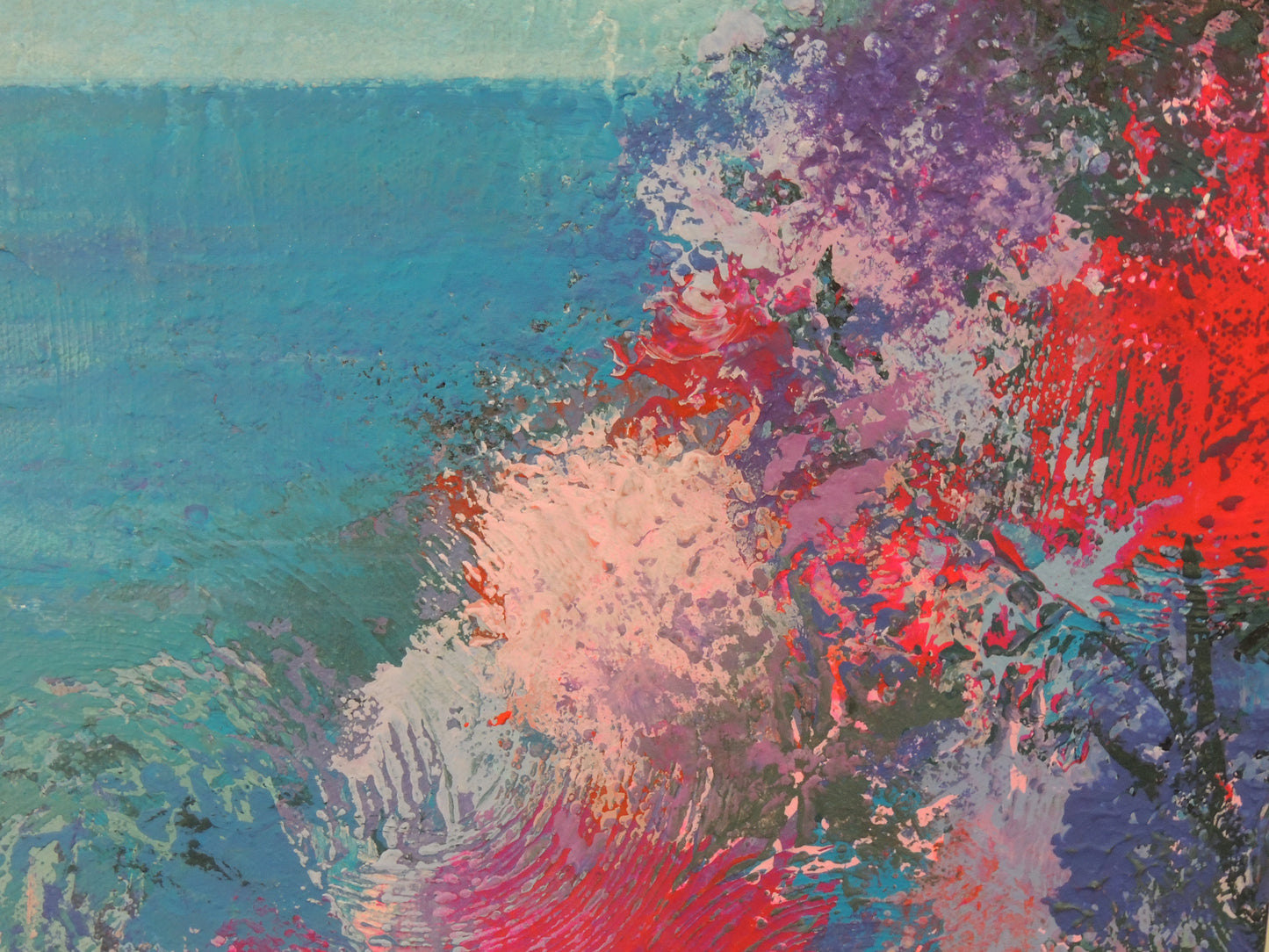 Detail 2 of flowers with sky and ocean in distance.